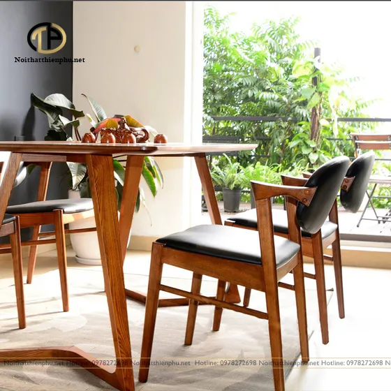 Chi tiết ghế Kai với tựa lưng cong và tay vịn thoải mái, một phần của bộ bàn ăn giá rẻ Hà Nội chất lượng cao